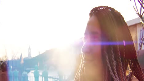 woman with braids outdoors