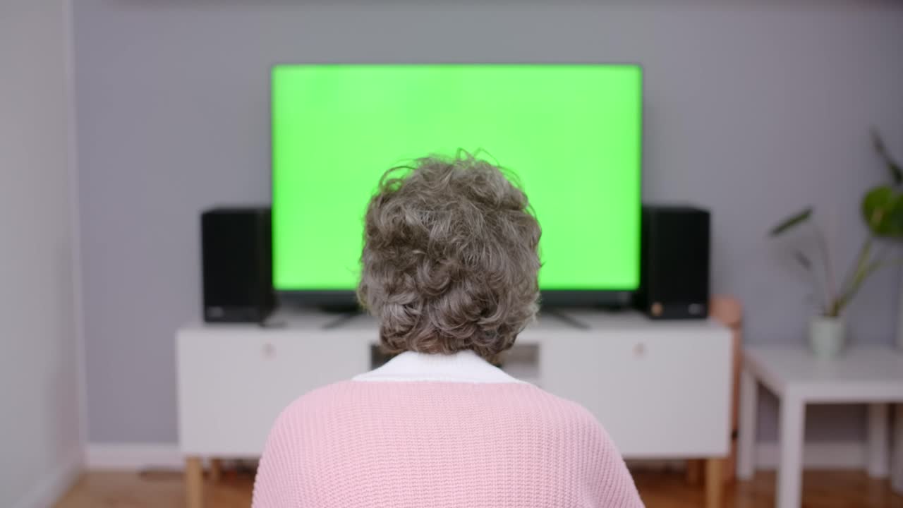 Elderly Woman Watching TV