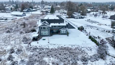 a mansion in america covered in snow