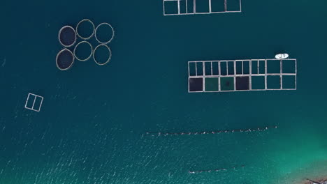 Aerial-view-of-fish-farm-in-a-bay-in-the-Mediterranean-Sea