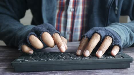 person typing on a keyboard