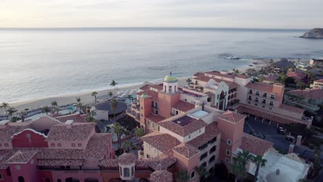 static aerial over hacienda del mar resort and cabo beach in mexico