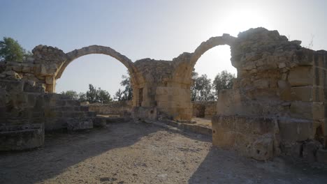 Cinematic-shot-of-the-famous-arches-of-the-Saranta-Kolones-Greek-castle-ruins,-also-known-as-Forty-Columns