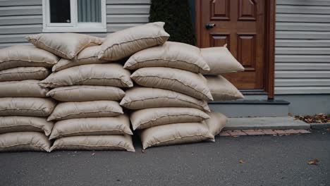 sandbags piled up in front of a house