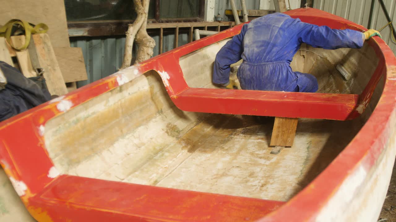 Wiping down sanded fiberglass boat hull
