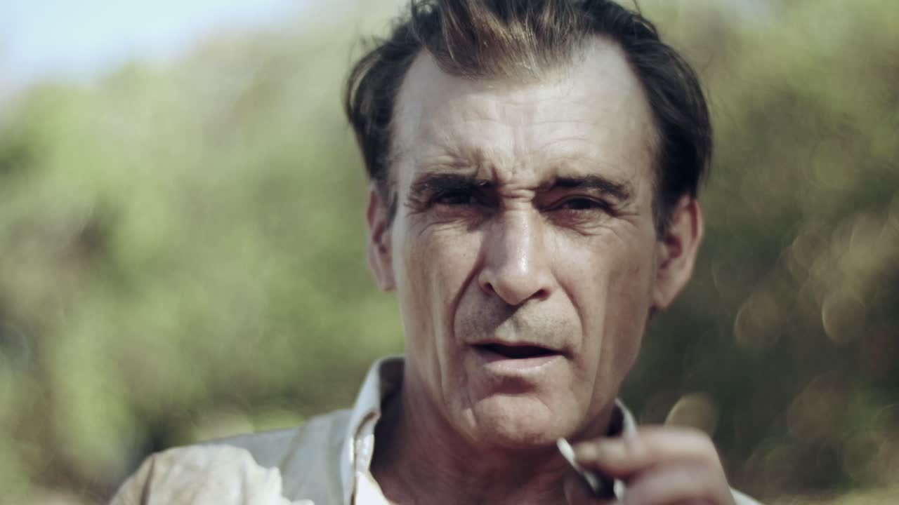 Man smoking a cigarette outdoors