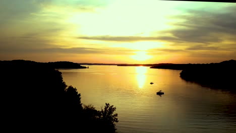 aerial view of lake at sunset