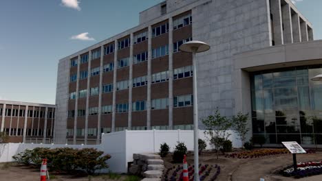 oakland county courthouse in michigan with gimbal video panning left to right medium shot