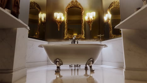 luxurious bathroom with ornate clawfoot bathtub and marble finishes