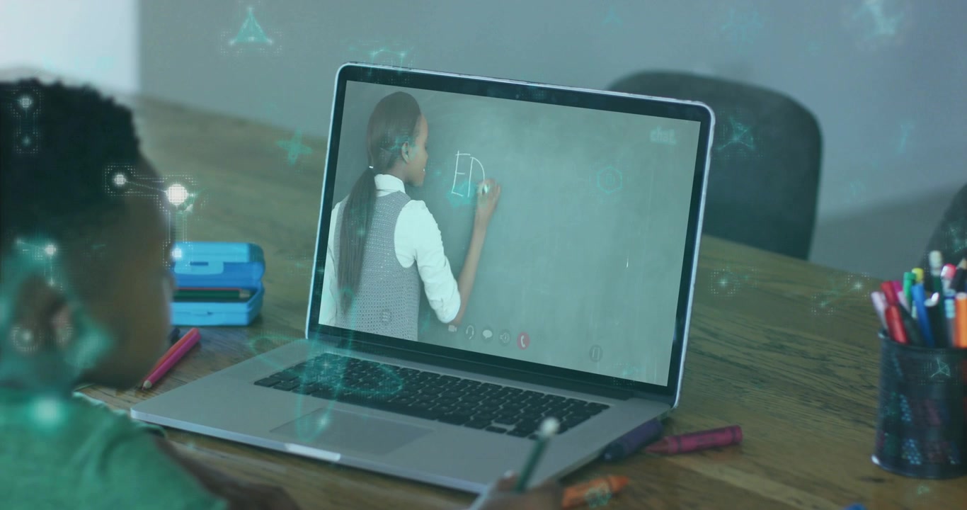 Teacher writing on board causing teal UI, child copying paper by pencil using laptop for learning