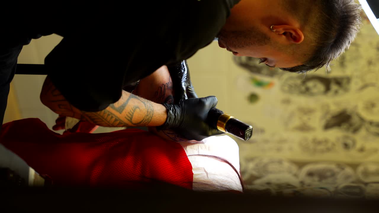 Tattoo artist at work