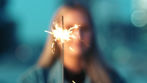 Sparkle,-woman-and-birthday-sparkler-of-a-person