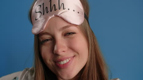 woman wearing sleep mask, funny expressions