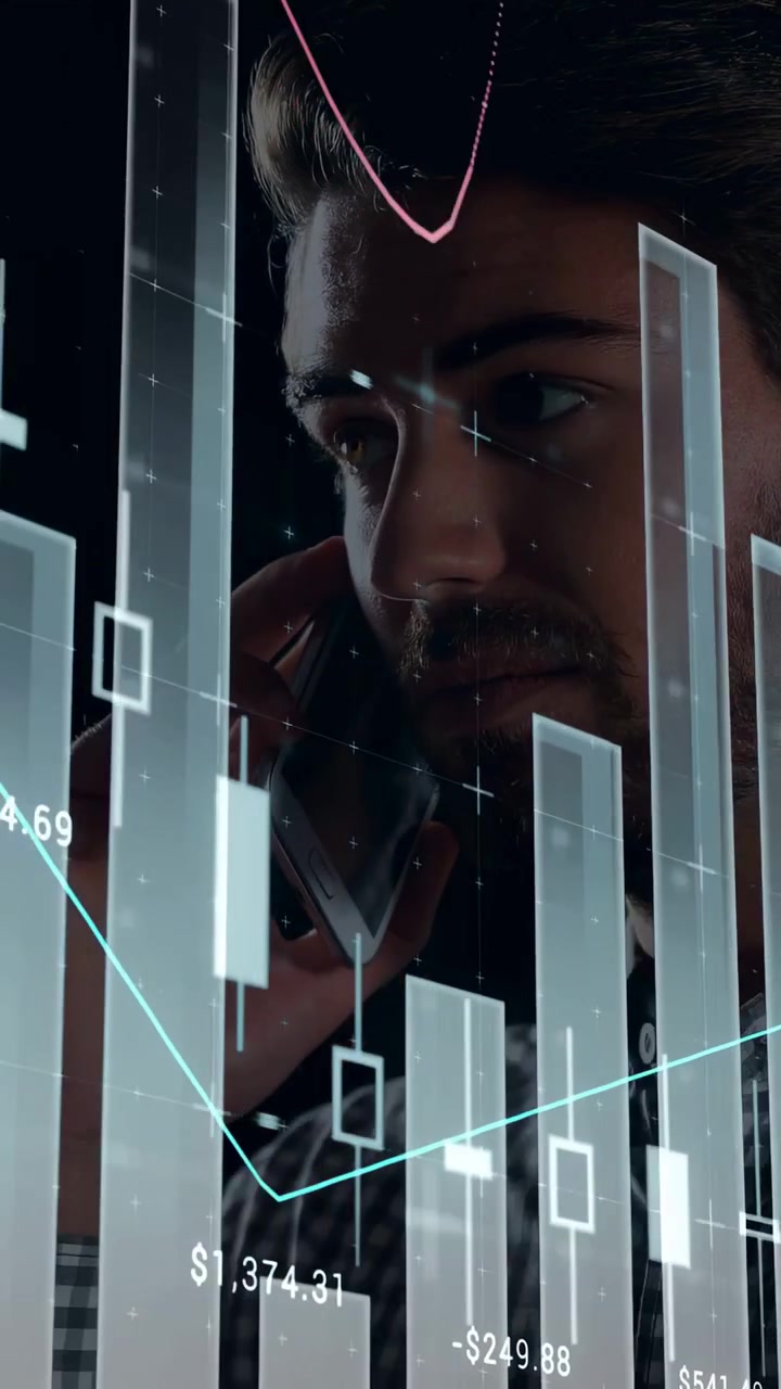 Vertical video: Trader raising smartphone and making trade call while charts overlaying face