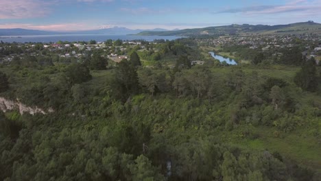 aerial view rising over the waikato river in taupo, new zealand