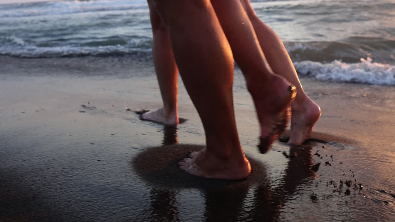 Walking on the beach at sunset