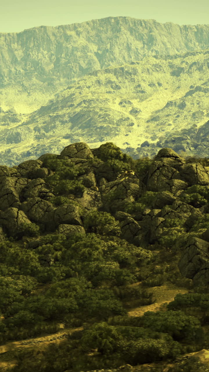 Scenic mountain landscape with rocky formations and lush greenery