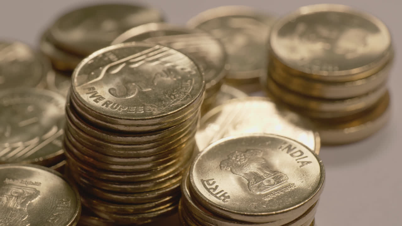 indian 5 rupees gold coated coin towers with indian national emblem, semi orbit short, 4k