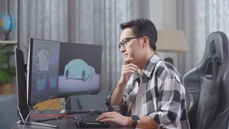 man working on 3d car design in home office