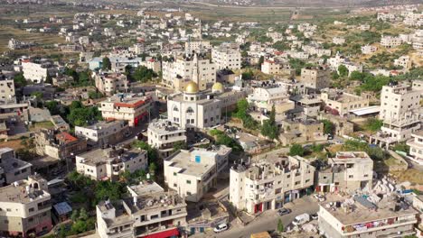 aerial view over hamas golden dome mosque in palestine town biddu,near jerusalem