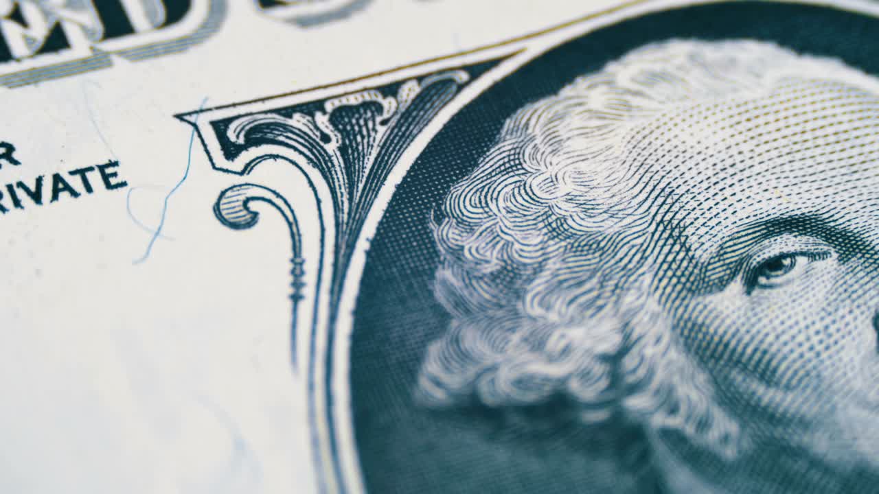 Slow Rotating George Washington Portrait on One Dollar Bill