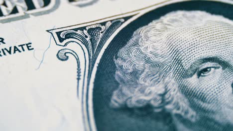 el retrato de george washington girando lentamente en un billete de un dólar