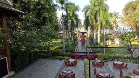 outdoor restaurant setting in a lush garden