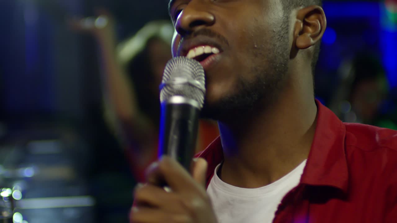 Face of Singing Black Man with Microphone