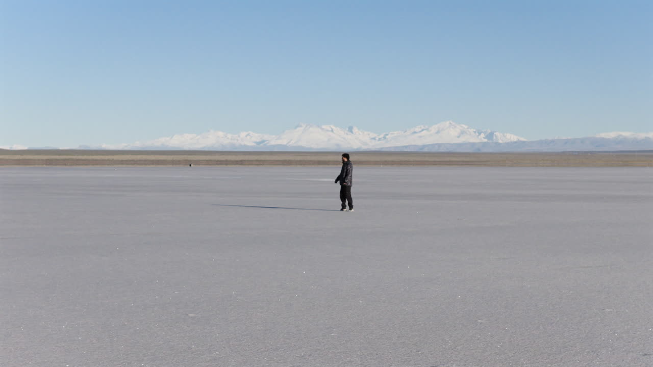 Man walks with uncertain direction, symbolizing psychological disconnection, spiritual search
