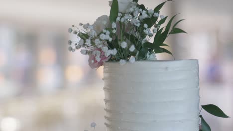 a slow motion panning shot of a wedding cake