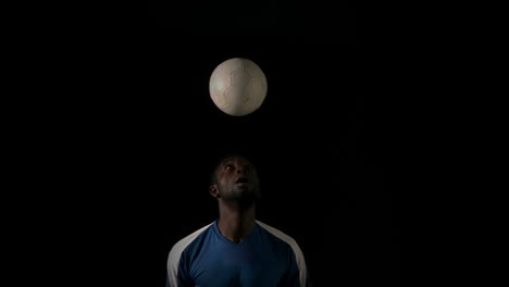 Football-player-heading-the-ball-