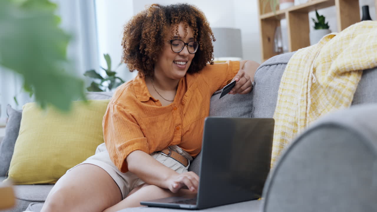 Home, laptop and woman with credit card