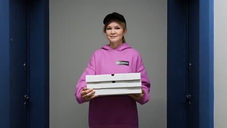 woman holding food boxes