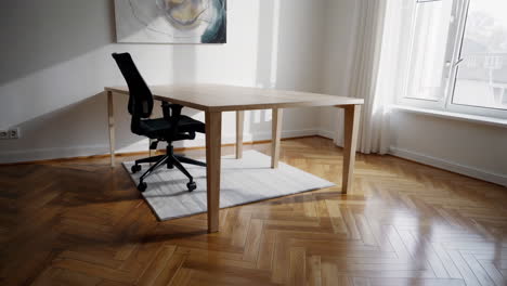 black ergonomic office chair and wooden desk in a modern home office setup