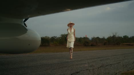 woman in a dress at the airport