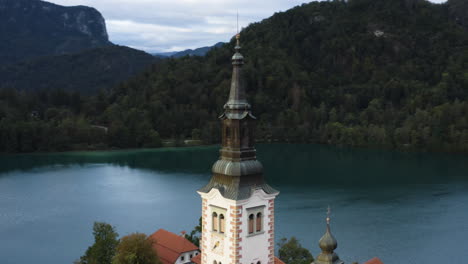 Lake-Bled-In-Spring,-Julian-Alps,-Slovenia---aerial-orbit