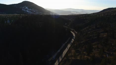 cruising along the highway: aerial view of a car on a scenic drive