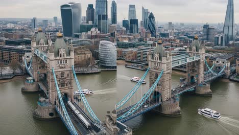 panoramic aerial view of london's tower bridge and iconic city skyline