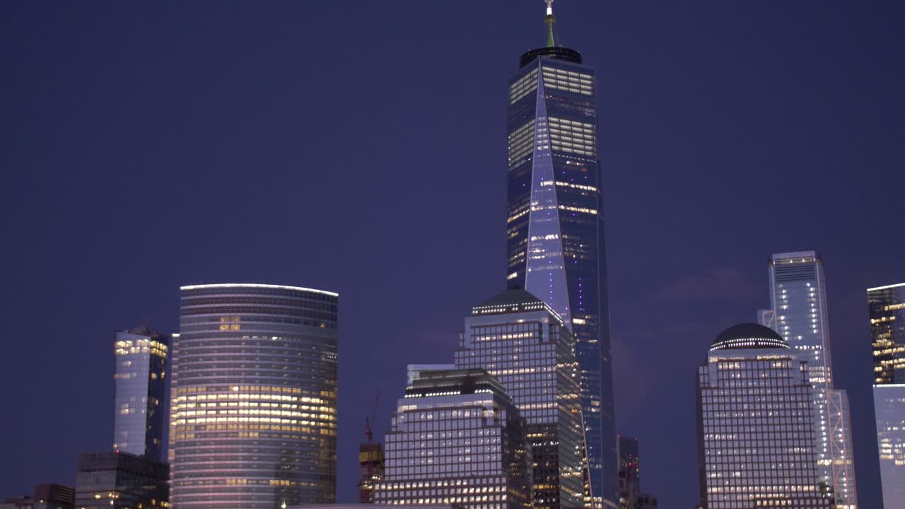 handheld shot of New York skyline at sunset on hudson river