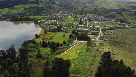 aerial panorama of warrington settlement on coast of otago region, new zealand