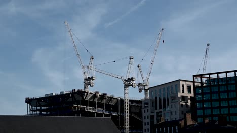 cranes workings on building the new google office near to kings cross, london, united kingdom