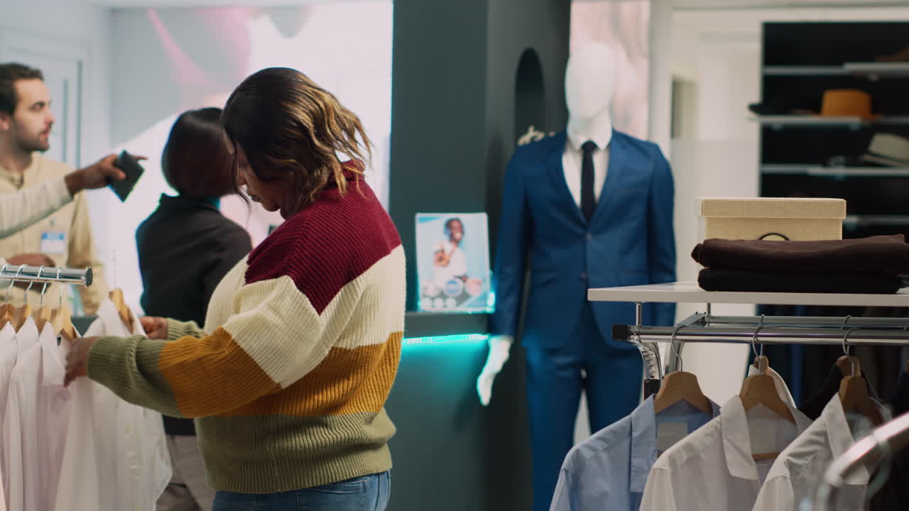 People shopping for clothes at a retail store