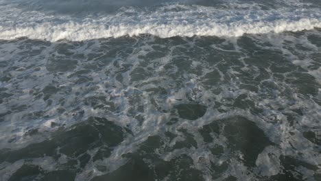 aerial view of waves crashing in the ocean at ship bottom, long beach island, new jersey