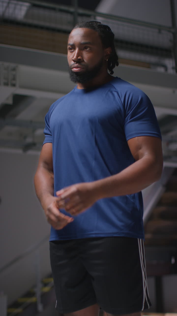 Vertical Video Of Male Athlete Or Boxer Training In Gym Sparring And Warming Up Preparing For Sports Event Or Fight 1