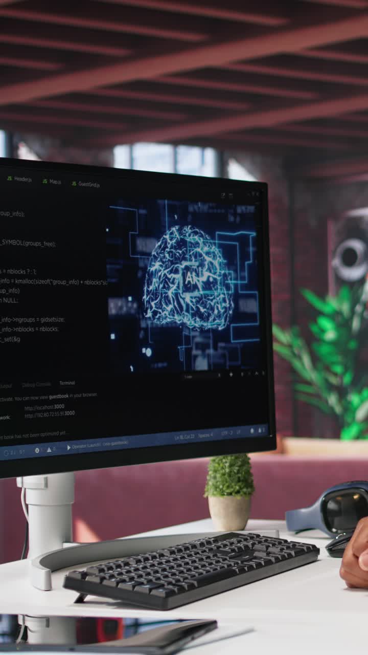 Vertical Video African american engineer coding a neural network AI brain model