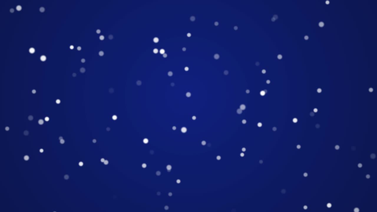 파란색 배경에 겨울 눈이 내리는 작은 눈알이 떨어집니다.