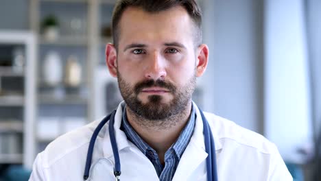 portrait of serious confident doctor