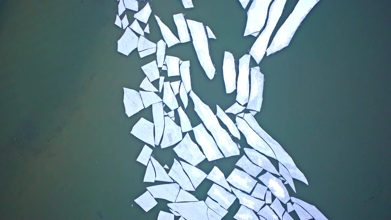 Drone flyover of frozen Upper Peninsula scenery near the Soo Locks