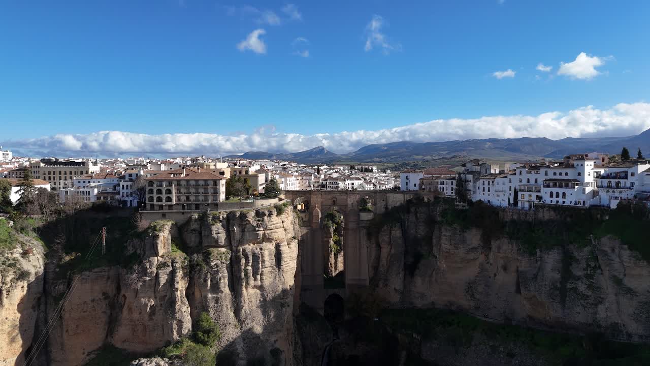 Magnificent village built on a rocky gorge. Aerial dolly in view