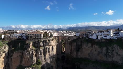 magnificent village built on a rocky gorge. aerial dolly in view